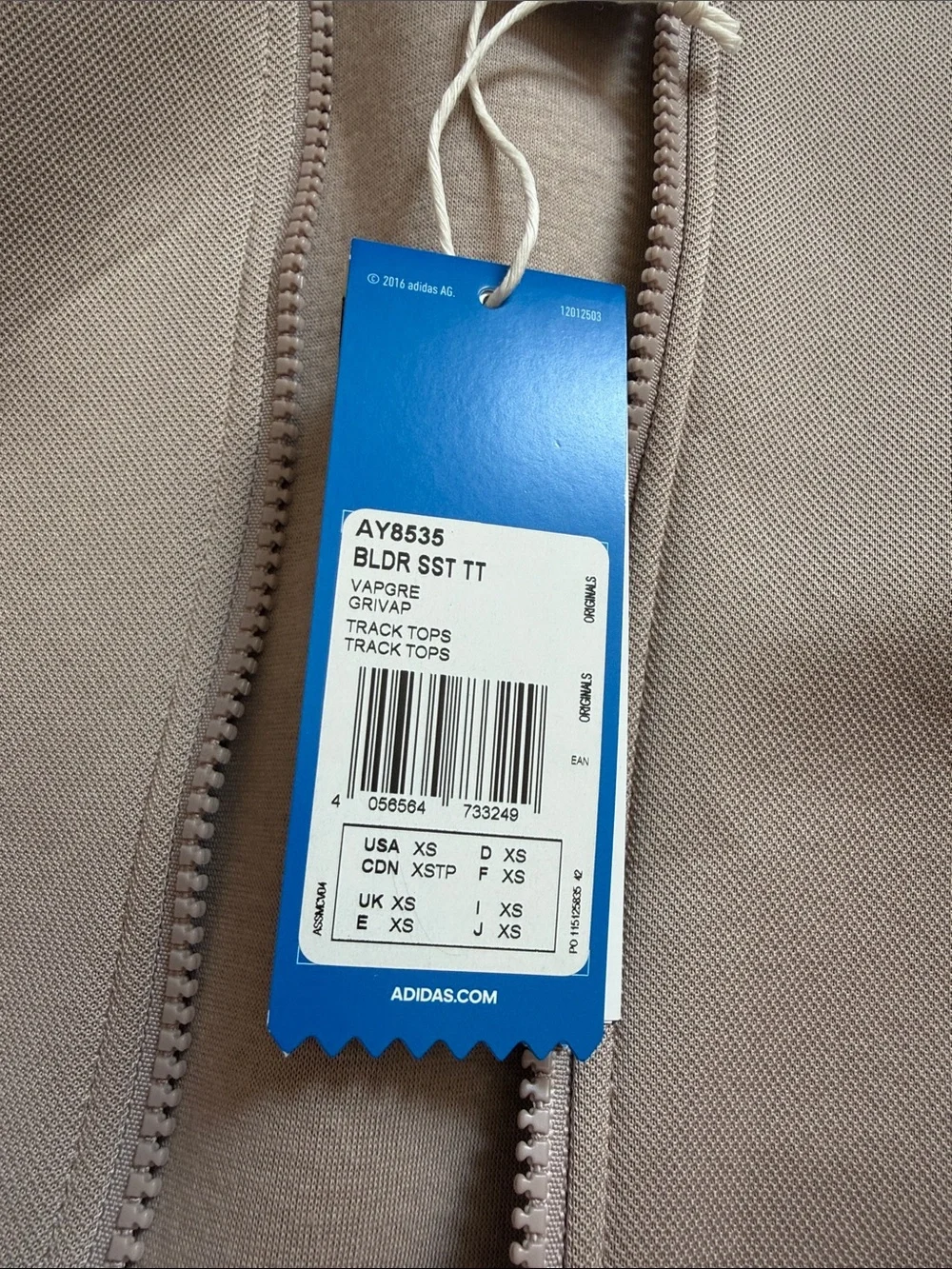 adidas beige bomber jacket with front flap pockets